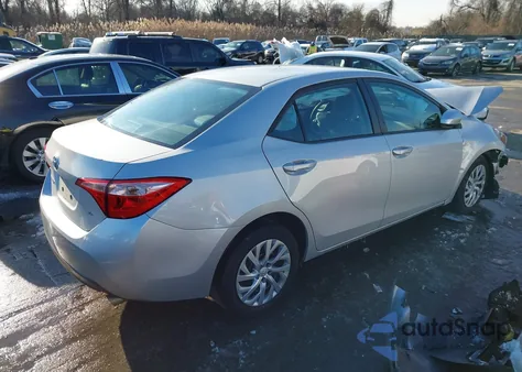 2017 Toyota Corolla Le z USA, uszkodzony, nr VIN 2T1BURHE0HC877588